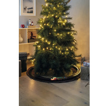 Sapin de Noël artificiel avec lumières LED et un petit train sur des rails en dessous, entouré de cadeaux.