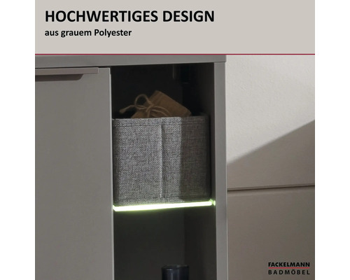 Offenes Fach eines Badschranks mit einer grauen Aufbewahrungsbox aus Polyester und integrierter LED Beleuchtung. Fackelmann Badmöbel Logo.