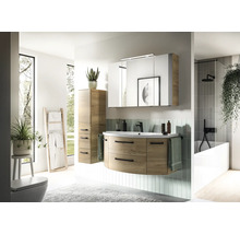 Ensemble de meubles de salle de bains moderne avec meuble sous-vasque arrondi aspect bois, lavabo, armoire de toilette éclairée et colonne.