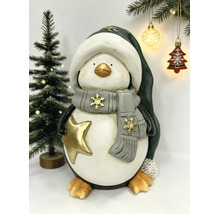 Weihnachtsfigur Pinguin mit Wintermütze, Schal und goldenem Stern.