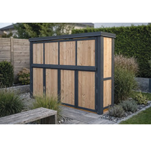 Moderne Mülltonnenbox aus Holz mit anthrazitfarbenem Rahmen in einem Garten mit Pflanzen und Kies.