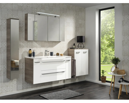 Ensemble de meubles de salle de bains avec meuble sous vasque blanc, armoire de toilette et colonne aspect bois et blanc.