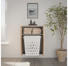 Meuble de salle de bain suspendu aspect bois avec portes ouvertes, panier à linge intégré et étagère pour serviettes.