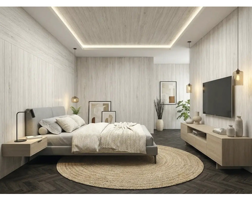 Chambre moderne avec lambris et panneaux de plafond clairs aspect bois, éclairage indirect, lit double et parquet en chevrons sombre.