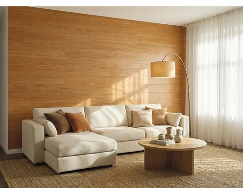 Salon lumineux avec panneaux muraux aspect bois, grand canapé d'angle, table ronde en bois et lampadaire sur un tapis naturel.