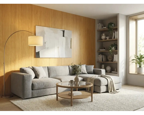 Salon lumineux avec canapé d angle gris, table basse ronde en bois, lampadaire arqué et panneaux muraux en bois.