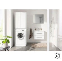 Salle de bain moderne et lumineuse avec un meuble pour lave-linge blanc au-dessus d'un lave-linge, un meuble sous-vasque et un miroir. (Image AI modified or generated)