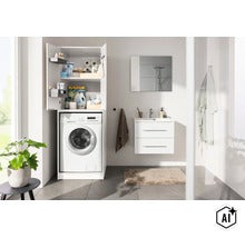 Salle de bain moderne avec meuble pour lave-linge blanc, machine à laver intégrée, meuble sous-vasque et miroir. (Image AI modified or generated)