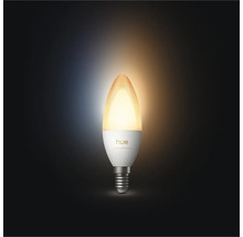 Ampoule LED Philips Hue White Ambiance flamme E14, lumière blanc chaud.