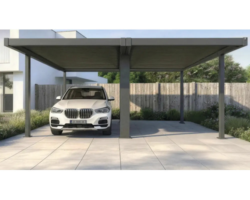 Moderner Doppelcarport aus Aluminium mit Flachdach, ein Auto parkt auf einer gefliesten Einfahrt vor einem Holzzaun.