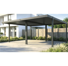Pergola autoportante en aluminium gris foncé avec toit à lames sur une terrasse dallée à côté d'une maison moderne.