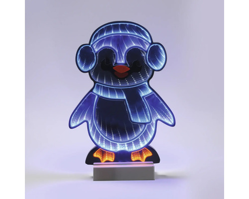 Lampe décorative LED pingouin avec effet tunnel, pingouin portant un bonnet et une écharpe sur un socle.