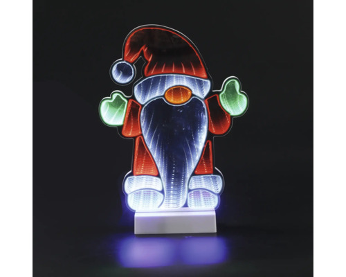 Lutin de Noël à LED avec effet miroir infini, figurine lumineuse décorative pour Noël sur socle blanc.