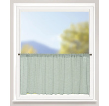 Rideau brise-bise en tissu vert texturé sur une tringle dans la moitié inférieure d'une fenêtre lumineuse.