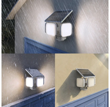 Solarbetriebene LED-Aussenwandleuchte mit zwei verstellbaren Köpfen und Bewegungsmelder bei Regen, Schnee und Sonnenschein.