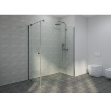 Douche à l'italienne moderne avec paroi en verre sans cadre, système de douche en métal et carrelage aspect béton.