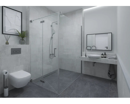 Salle de bains moderne et lumineuse avec douche à l'italienne en verre, toilettes suspendues, vasque à poser et miroir.