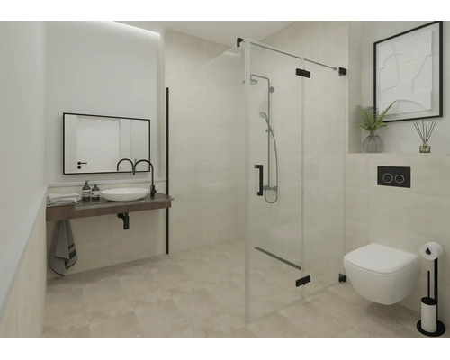 Salle de bain moderne avec cabine de douche en verre, robinetterie noire, WC suspendu blanc et vasque à poser sur un plan de travail sombre.
