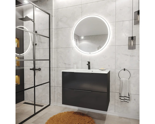 Salle de bains moderne avec meuble sous-vasque sombre, miroir LED rond et douche à l'italienne avec cadre noir.