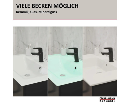 Lavabos Fackelmann Badmöbel en céramique, verre et fonte minérale avec robinetterie sur meuble sous-vasque devant mur en marbre. Logo Fackelmann.