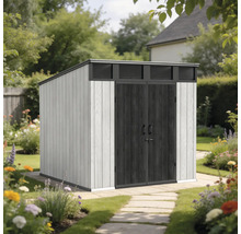 Abri de jardin moderne avec toit en appentis et double porte, situé dans un jardin avec des parterres de fleurs et un chemin en pierre.