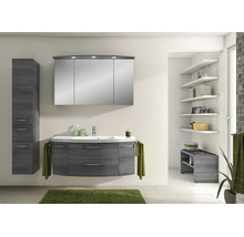 Ensemble de salle de bain moderne, décor bois foncé, avec meuble sous-vasque, lavabo céramique, armoire de toilette éclairée et colonne.