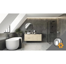 Modernes Badezimmer unter Dachschräge mit freistehender Badewanne, hängendem Waschtisch, rundem Spiegel, grauen Fliesen und Terrazzo-Boden.