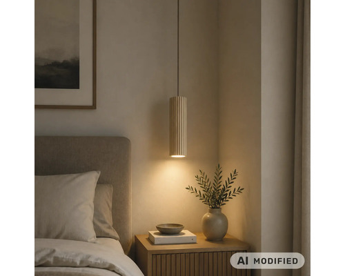 Suspension cylindrique en bois avec structure à lattes au-dessus d une table de nuit dans la chambre, lumière chaude.