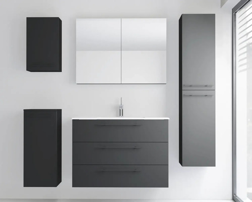 Ensemble de meubles de salle de bains moderne comprenant un meuble sous-lavabo à trois tiroirs, une armoire de toilette, une colonne et deux meubles latéraux.