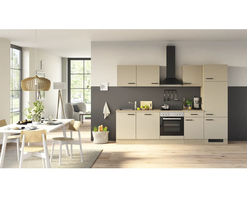 Cuisine équipée moderne avec des façades claires et des accents sombres dans un espace de vie ouvert avec coin repas attenant et grande fenêtre.