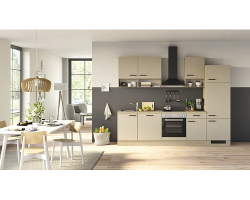 Cuisine amenagee moderne dans un espace de vie ouvert avec coin repas, facades claires, hotte aspirante noire et appareils encastres de qualite.