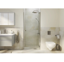 Modernes Badezimmer mit Glas Duschkabine, Waschbecken und Wand WC in hell gestalteter Umgebung.