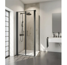 Douche d angle moderne avec portes pliantes et système de douche dans une salle de bain lumineuse avec lavabo.