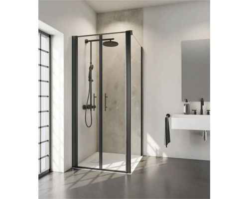 Douche d angle moderne avec portes pliantes et système de douche dans une salle de bain lumineuse avec lavabo.