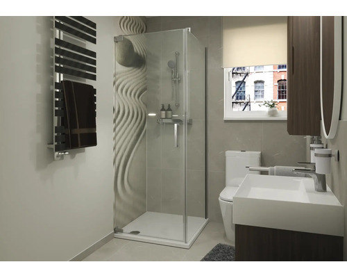 Salle de bain moderne avec douche d'angle, motif mural zen, toilettes au sol, lavabo avec meuble sous vasque et radiateur sèche-serviettes.