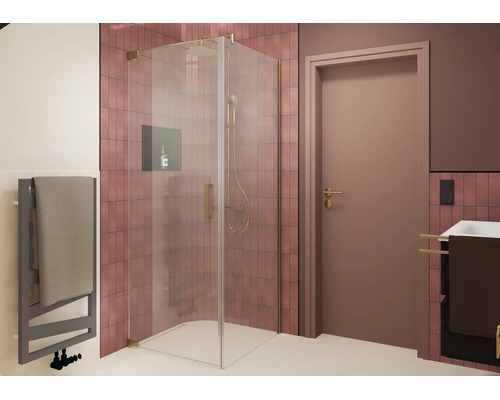 Douche dangle moderne avec porte en verre et robinetterie métallique dans une salle de bain carrelée avec sèche serviettes et lavabo