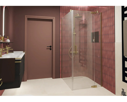 Douche d angle moderne en verre véritable avec ferrures dans une salle de bain avec carreaux carrés et lavabo avec robinetterie dorée.