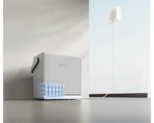 Station d'énergie portable Ecovacs avec batterie intégrée, connectée à une prise de courant.