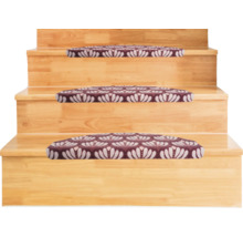 Tapis de marche demi-ronds avec motif floral sur un escalier en bois