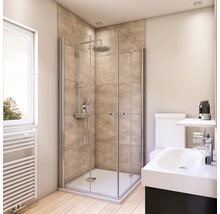 Salle de bains moderne avec cabine de douche, lavabo et radiateur.