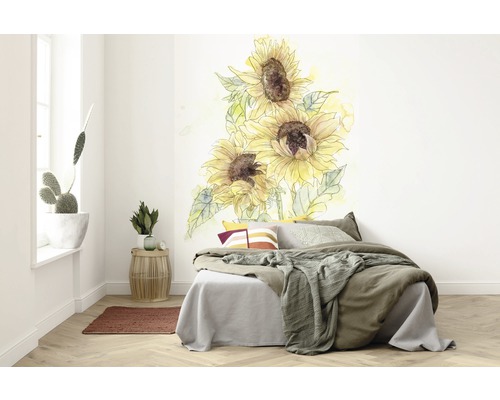 Chambre à coucher avec sticker mural de tournesols au-dessus du lit
