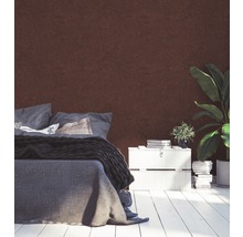 Chambre avec lit, table de chevet et plante d''intérieur