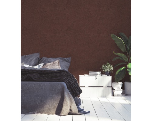 Chambre avec lit, table de chevet et plante d''intérieur