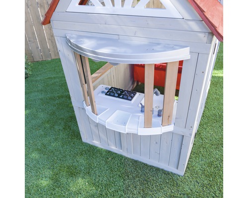 Vue détaillée d''une cabane de jeu avec cuisine de jeu intégrée