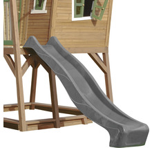 Toboggan pour enfants gris sur une cabane de jeu