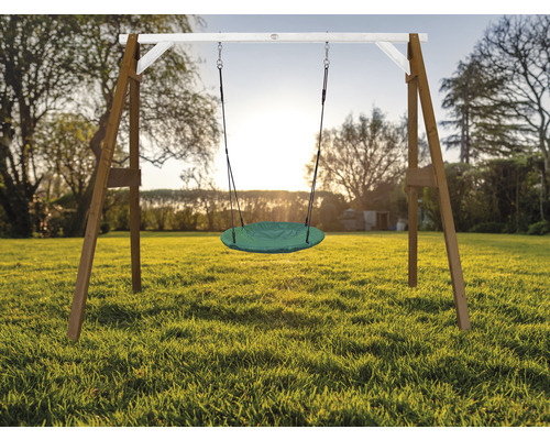 Balançoire en bois avec assise ronde sur pelouse