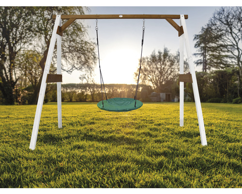 Portique avec balançoire nid d''oiseau dans le jardin