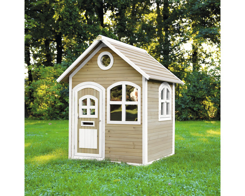 Maisonnette en bois avec porte et fenêtres dans le jardin