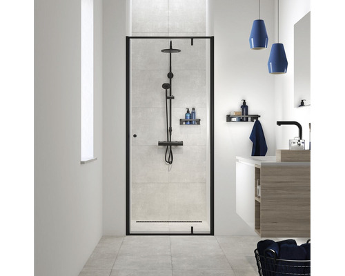 Salle de bains moderne avec paroi de douche, robinetterie et meuble sous-lavabo