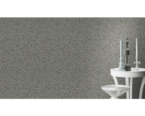 Graue Tapete mit abstraktem Muster an der Wand